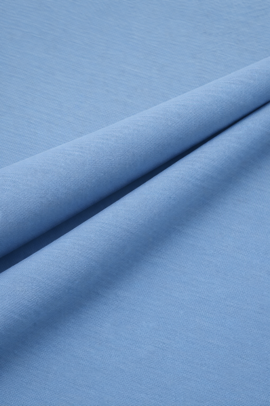 Close-up of snow blue fabric with a subtle texture