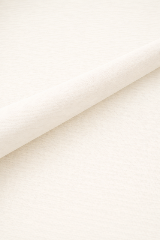 Close_up_texture_detail_of_beige_oversized_cotton_t-shirt