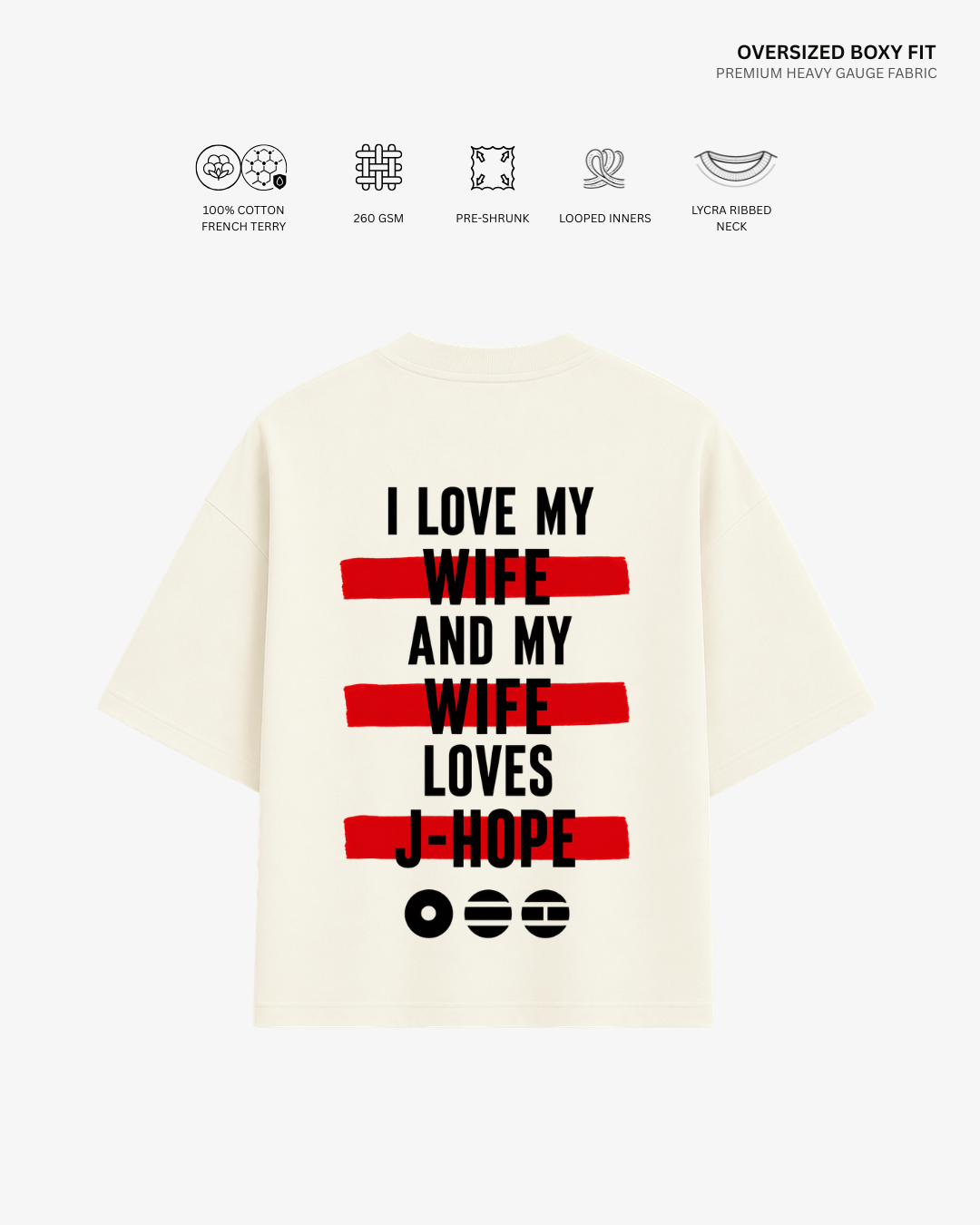 An oversized cream-colored T-shirt shown from the back, featuring a bold graphic print with black text and red horizontal stripes. The text reads 'I LOVE MY WIFE AND MY WIFE LOVES J-HOPE'.