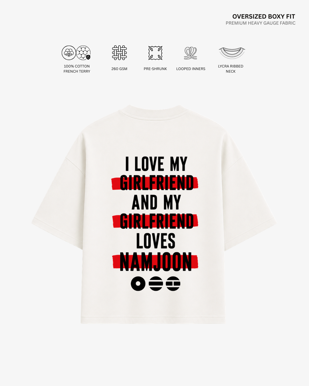 An oversized white boxy-fit T-shirt shown from the back, featuring a bold graphic print with black text and red highlight marks. The text reads 'I LOVE MY GIRLFRIEND AND MY GIRLFRIEND LOVES NAMJOON' with three smiley faces below.