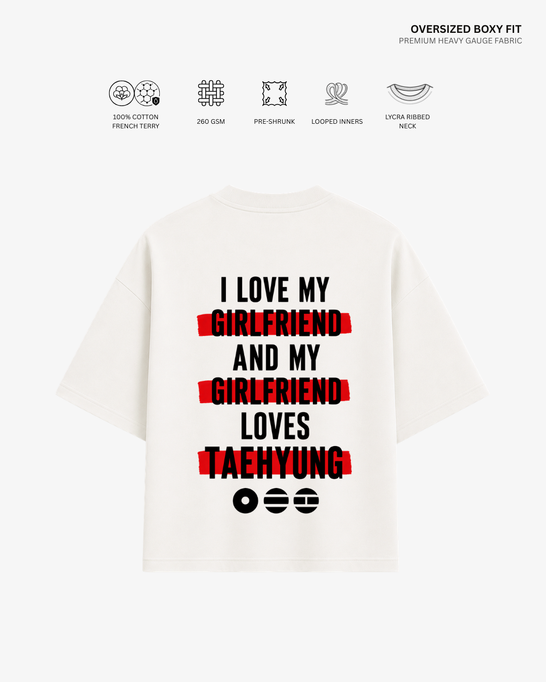 An oversized white boxy-fit T-shirt shown from the back, featuring the text 'I LOVE MY GIRLFRIEND AND MY GIRLFRIEND LOVES TAEHYUNG' in black with red horizontal highlight bars. Small fabric feature icons and text appear above the shirt on a light gray background.
